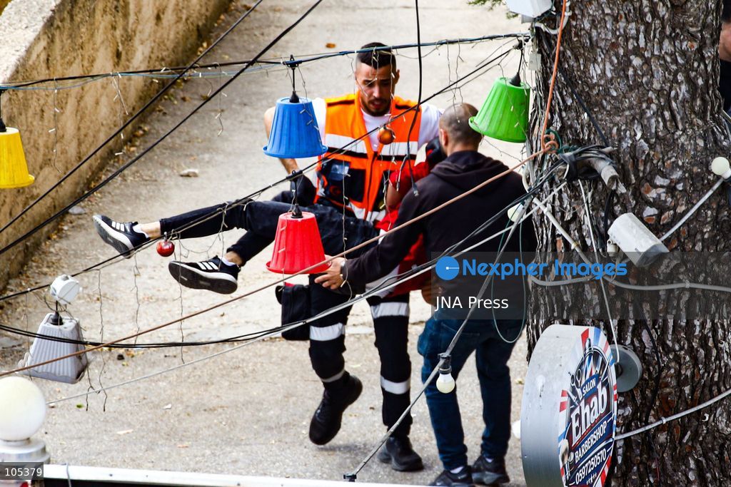 RAMALLAH, WEST BANK, PALESTINE, OCTOBER 13, 2026: Israeli forces conduct a raid in Ramallah in the occupied West Bank. The operation includes a raid on the offices of Addameer Prisoner Support and Human Rights Association. The Palestinian Ministry of Health reported two people wounded, including a 14-year-old boy wounded by Israeli gunfire, while several others were treated for tear gas inhalation. Photo by Salman Mohsen Alkhatib / JNA Press. (Photo by Salman Mohsen Alkhatib/JNA Press via Nexpher Images)