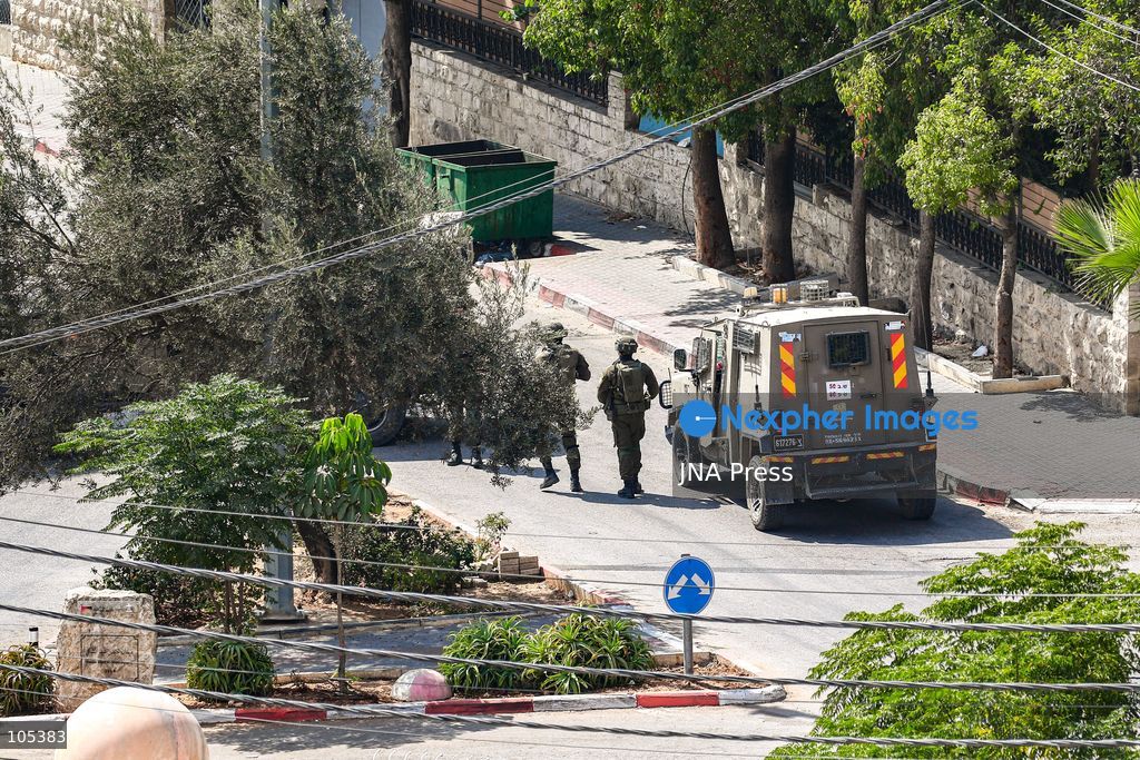 RAMALLAH, WEST BANK, PALESTINE, OCTOBER 13, 2026: Israeli forces conduct a raid in Ramallah in the occupied West Bank. The operation includes a raid on the offices of Addameer Prisoner Support and Human Rights Association. The Palestinian Ministry of Health reported two people wounded, including a 14-year-old boy wounded by Israeli gunfire, while several others were treated for tear gas inhalation. Photo by Salman Mohsen Alkhatib / JNA Press. (Photo by Salman Mohsen Alkhatib/JNA Press via Nexpher Images)