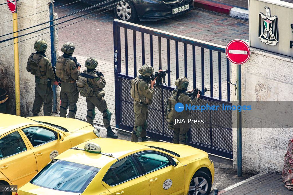 RAMALLAH, WEST BANK, PALESTINE, OCTOBER 13, 2026: Israeli forces conduct a raid in Ramallah in the occupied West Bank. The operation includes a raid on the offices of Addameer Prisoner Support and Human Rights Association. The Palestinian Ministry of Health reported two people wounded, including a 14-year-old boy wounded by Israeli gunfire, while several others were treated for tear gas inhalation. Photo by Salman Mohsen Alkhatib / JNA Press. (Photo by Salman Mohsen Alkhatib/JNA Press via Nexpher Images)