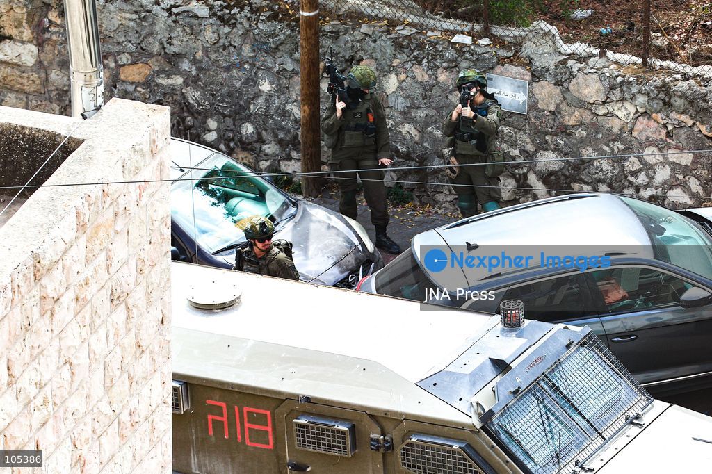 RAMALLAH, WEST BANK, PALESTINE, OCTOBER 13, 2026: Israeli forces conduct a raid in Ramallah in the occupied West Bank. The operation includes a raid on the offices of Addameer Prisoner Support and Human Rights Association. The Palestinian Ministry of Health reported two people wounded, including a 14-year-old boy wounded by Israeli gunfire, while several others were treated for tear gas inhalation. Photo by Salman Mohsen Alkhatib / JNA Press. (Photo by Salman Mohsen Alkhatib/JNA Press via Nexpher Images)