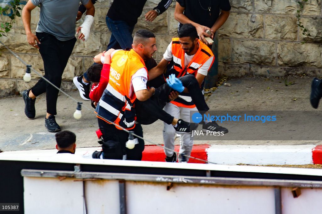 RAMALLAH, WEST BANK, PALESTINE, OCTOBER 13, 2026: Israeli forces conduct a raid in Ramallah in the occupied West Bank. The operation includes a raid on the offices of Addameer Prisoner Support and Human Rights Association. The Palestinian Ministry of Health reported two people wounded, including a 14-year-old boy wounded by Israeli gunfire, while several others were treated for tear gas inhalation. Photo by Salman Mohsen Alkhatib / JNA Press. (Photo by Salman Mohsen Alkhatib/JNA Press via Nexpher Images)