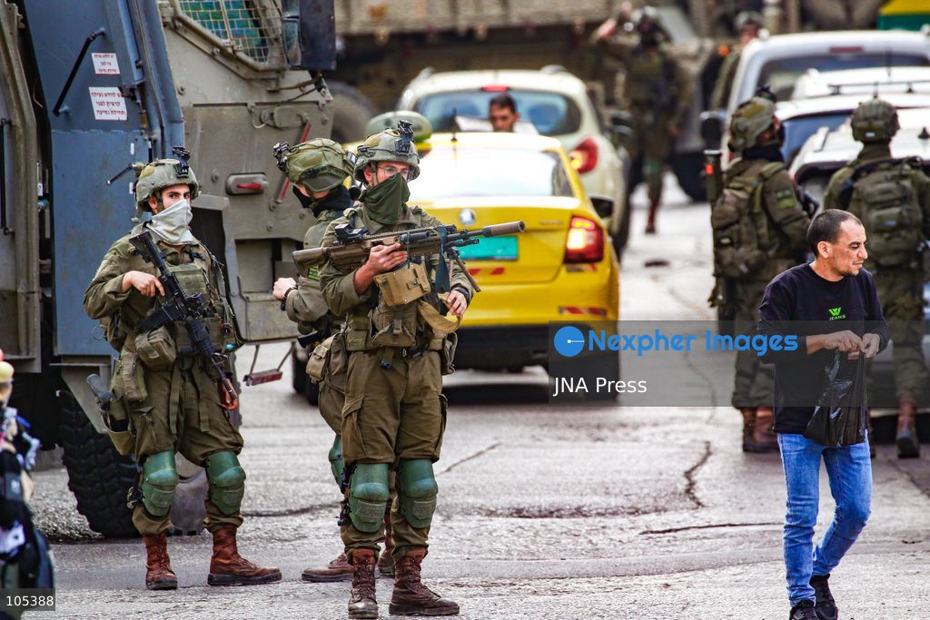 RAMALLAH, WEST BANK, PALESTINE, OCTOBER 13, 2026: Israeli forces conduct a raid in Ramallah in the occupied West Bank. The operation includes a raid on the offices of Addameer Prisoner Support and Human Rights Association. The Palestinian Ministry of Health reported two people wounded, including a 14-year-old boy wounded by Israeli gunfire, while several others were treated for tear gas inhalation. Photo by Salman Mohsen Alkhatib / JNA Press. (Photo by Salman Mohsen Alkhatib/JNA Press via Nexpher Images)