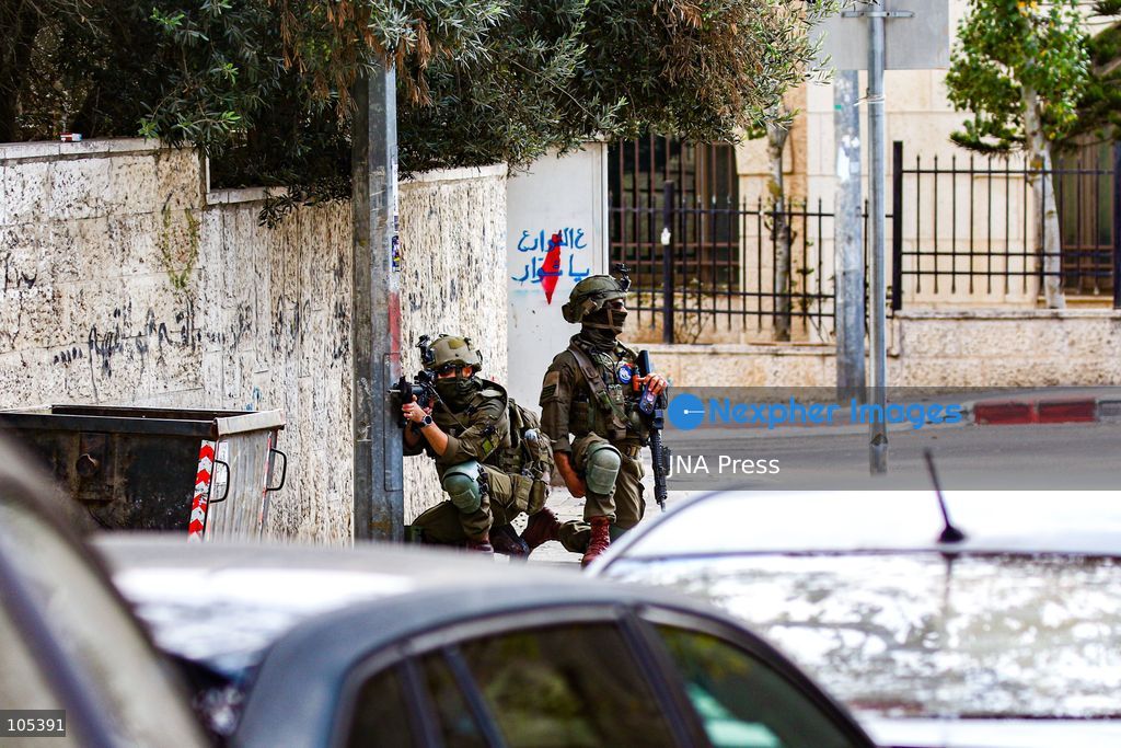 RAMALLAH, WEST BANK, PALESTINE, OCTOBER 13, 2026: Israeli forces conduct a raid in Ramallah in the occupied West Bank. The operation includes a raid on the offices of Addameer Prisoner Support and Human Rights Association. The Palestinian Ministry of Health reported two people wounded, including a 14-year-old boy wounded by Israeli gunfire, while several others were treated for tear gas inhalation. Photo by Salman Mohsen Alkhatib / JNA Press. (Photo by Salman Mohsen Alkhatib/JNA Press via Nexpher Images)