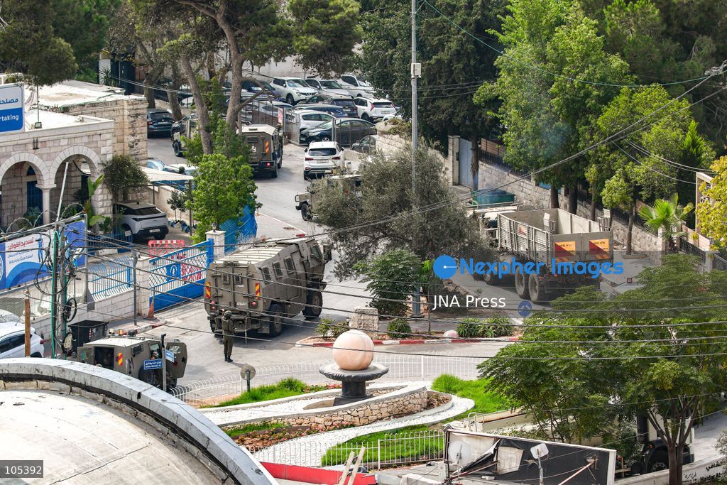 RAMALLAH, WEST BANK, PALESTINE, OCTOBER 13, 2026: Israeli forces conduct a raid in Ramallah in the occupied West Bank. The operation includes a raid on the offices of Addameer Prisoner Support and Human Rights Association. The Palestinian Ministry of Health reported two people wounded, including a 14-year-old boy wounded by Israeli gunfire, while several others were treated for tear gas inhalation. Photo by Salman Mohsen Alkhatib / JNA Press. (Photo by Salman Mohsen Alkhatib/JNA Press via Nexpher Images)