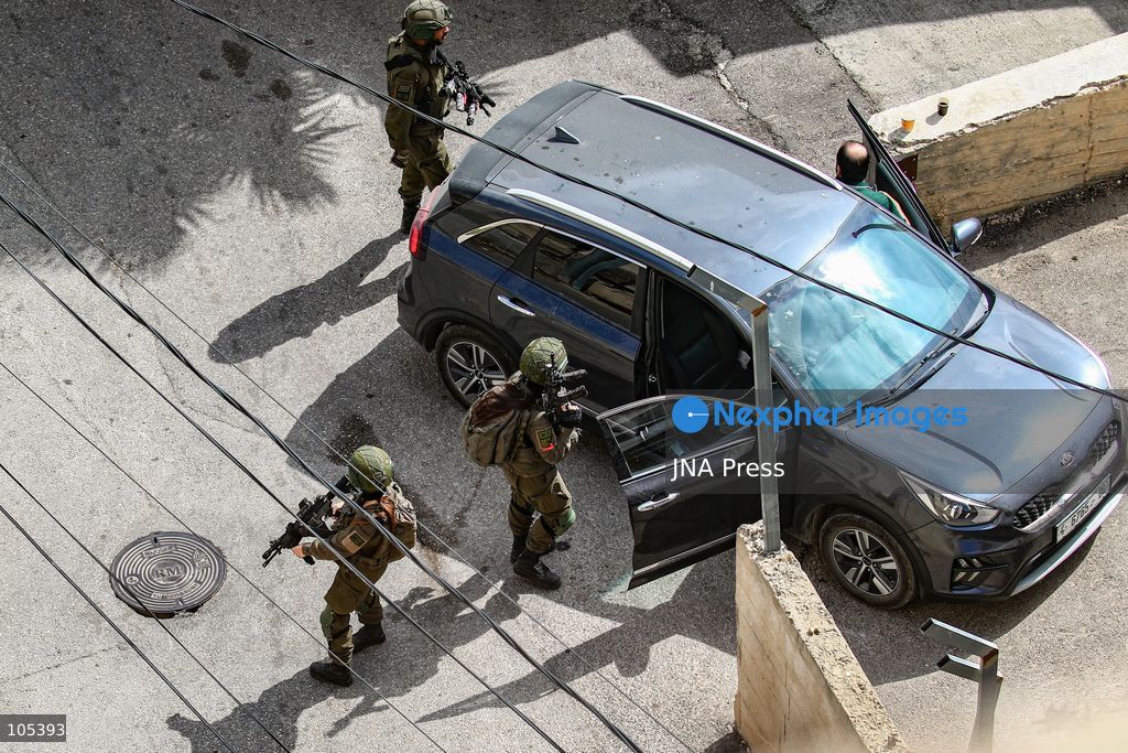 RAMALLAH, WEST BANK, PALESTINE, OCTOBER 13, 2026: Israeli forces conduct a raid in Ramallah in the occupied West Bank. The operation includes a raid on the offices of Addameer Prisoner Support and Human Rights Association. The Palestinian Ministry of Health reported two people wounded, including a 14-year-old boy wounded by Israeli gunfire, while several others were treated for tear gas inhalation. Photo by Salman Mohsen Alkhatib / JNA Press. (Photo by Salman Mohsen Alkhatib/JNA Press via Nexpher Images)