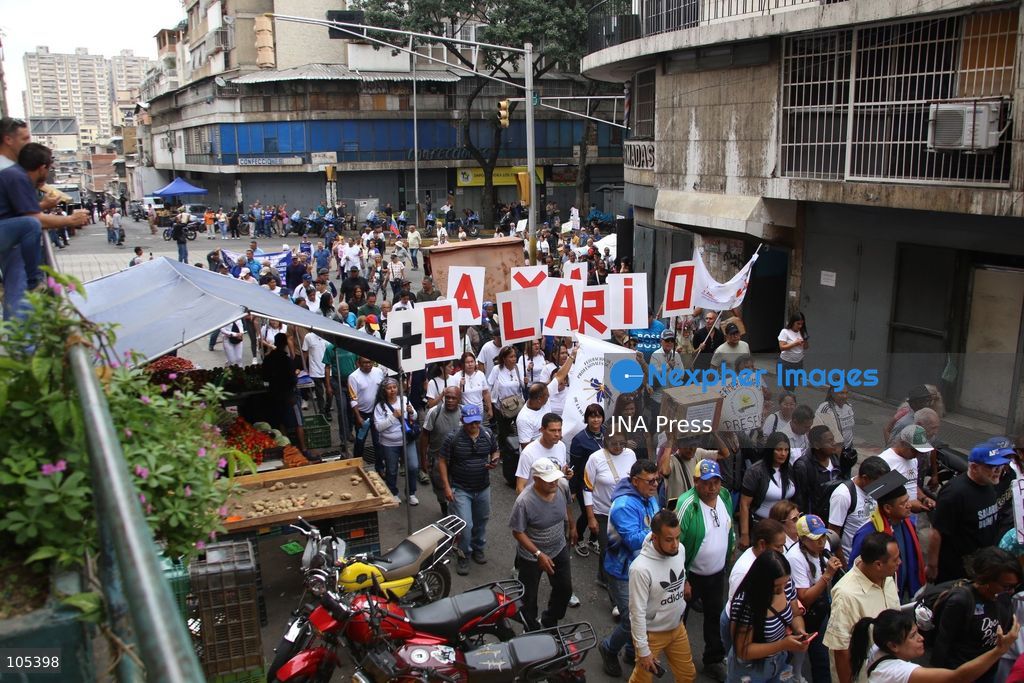 CARACAS, VENEZUELA, OCTOBER 13, 2026: Healthcare workers and teachers take part in a demonstration in central Caracas to demand higher wages and improved working conditions. The protest forms part of a joint mobilisation by unions representing health, education and university workers. Photo by Moises Quintero / JNA Press. (Photo by MoisÃ©s Quintero/JNA Press via Nexpher Images)