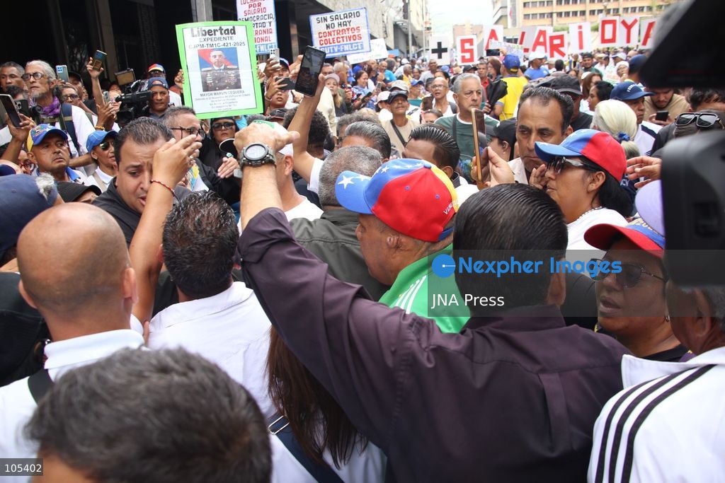 CARACAS, VENEZUELA, OCTOBER 13, 2026: Healthcare workers and teachers take part in a demonstration in central Caracas to demand higher wages and improved working conditions. The protest forms part of a joint mobilisation by unions representing health, education and university workers. Photo by Moises Quintero / JNA Press. (Photo by Moisés Quintero/JNA Press via Nexpher Images)