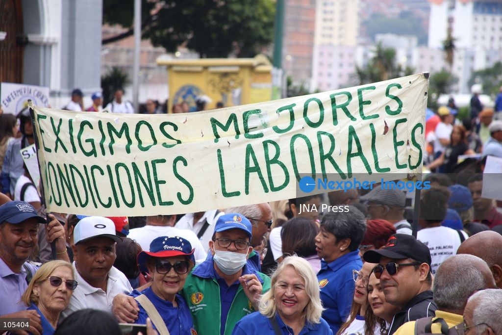 CARACAS, VENEZUELA, OCTOBER 13, 2026: Healthcare workers and teachers take part in a demonstration in central Caracas to demand higher wages and improved working conditions. The protest forms part of a joint mobilisation by unions representing health, education and university workers. Photo by Moises Quintero / JNA Press. (Photo by Moisés Quintero/JNA Press via Nexpher Images)