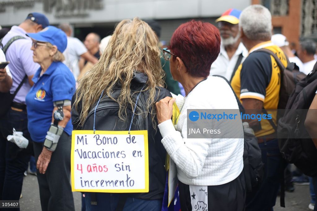 CARACAS, VENEZUELA, OCTOBER 13, 2026: Healthcare workers and teachers take part in a demonstration in central Caracas to demand higher wages and improved working conditions. The protest forms part of a joint mobilisation by unions representing health, education and university workers. Photo by Moises Quintero / JNA Press. (Photo by Moisés Quintero/JNA Press via Nexpher Images)