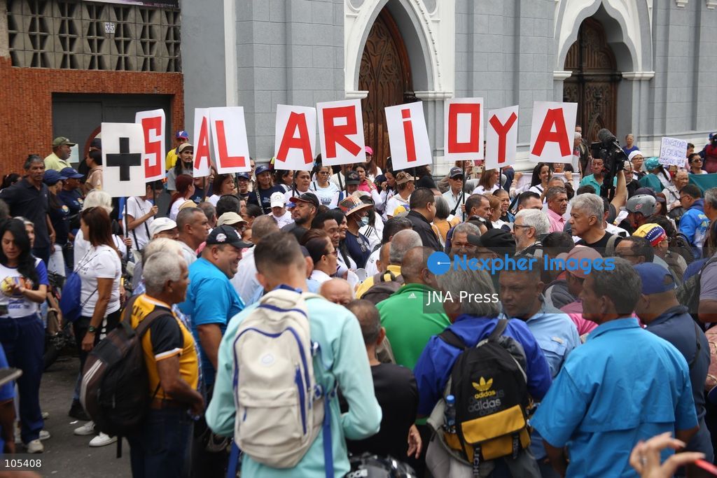 CARACAS, VENEZUELA, OCTOBER 13, 2026: Healthcare workers and teachers take part in a demonstration in central Caracas to demand higher wages and improved working conditions. The protest forms part of a joint mobilisation by unions representing health, education and university workers. Photo by Moises Quintero / JNA Press. (Photo by Moisés Quintero/JNA Press via Nexpher Images)