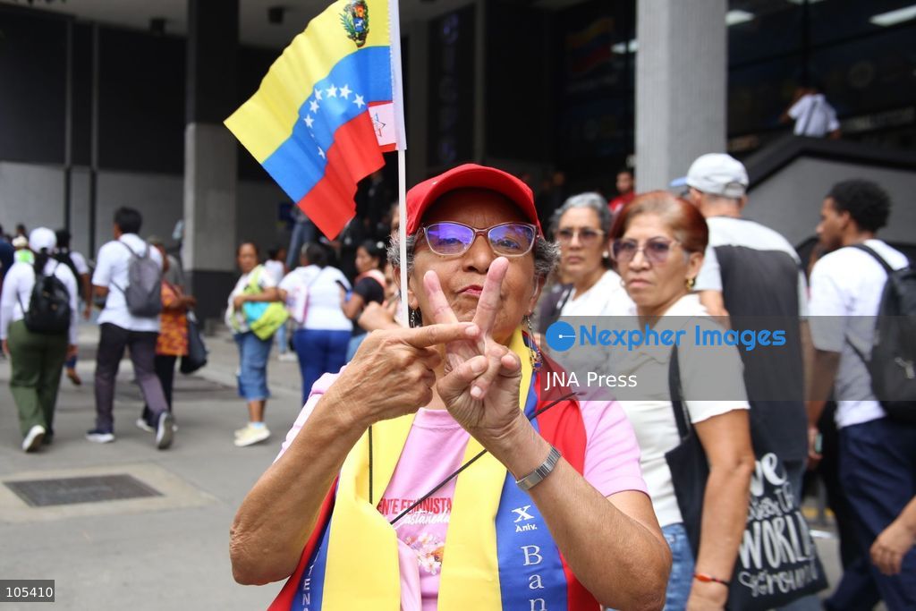 CARACAS, VENEZUELA, OCTOBER 13, 2026: Venezuelan government supporters take part in a march in central Caracas to demand the lifting of economic sanctions. The mobilisation was organised by the ruling United Socialist Party of Venezuela (PSUV). Photo by Moises Quintero / JNA Press. (Photo by Moisés Quintero/JNA Press via Nexpher Images)