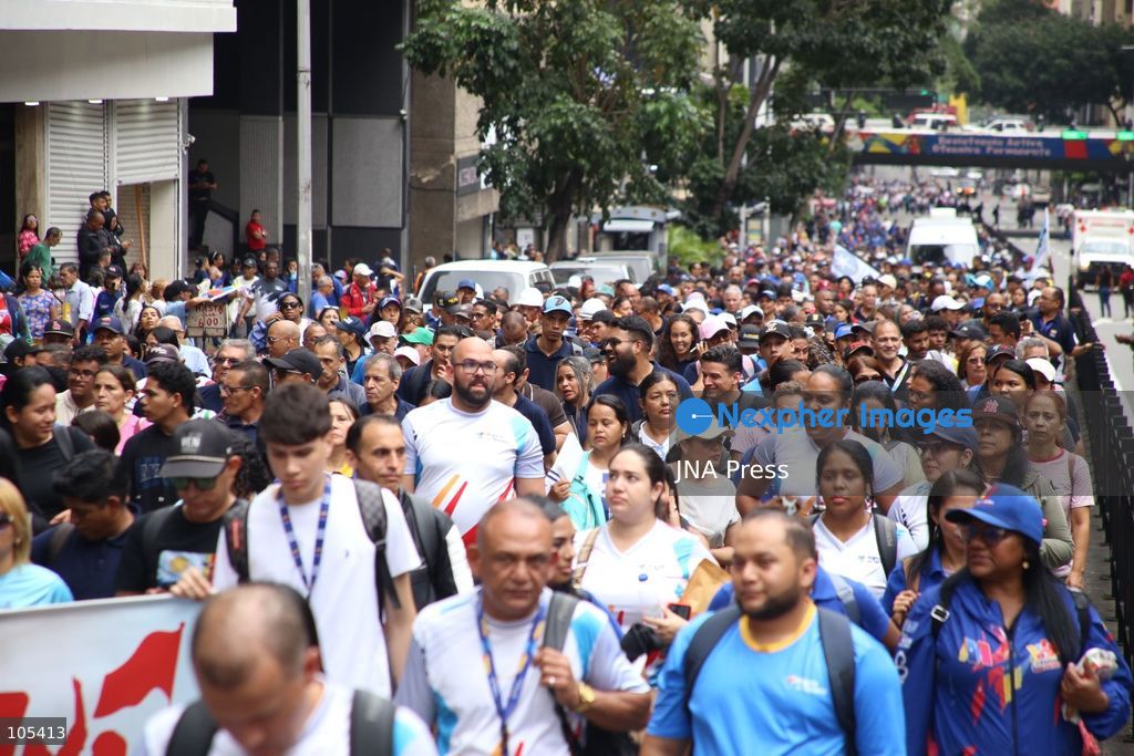 CARACAS, VENEZUELA, OCTOBER 13, 2026: Venezuelan government supporters take part in a march in central Caracas to demand the lifting of economic sanctions. The mobilisation was organised by the ruling United Socialist Party of Venezuela (PSUV). Photo by Moises Quintero / JNA Press. (Photo by Moisés Quintero/JNA Press via Nexpher Images)