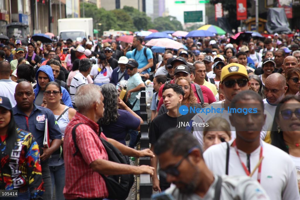 CARACAS, VENEZUELA, OCTOBER 13, 2026: Venezuelan government supporters take part in a march in central Caracas to demand the lifting of economic sanctions. The mobilisation was organised by the ruling United Socialist Party of Venezuela (PSUV). Photo by Moises Quintero / JNA Press. (Photo by Moisés Quintero/JNA Press via Nexpher Images)