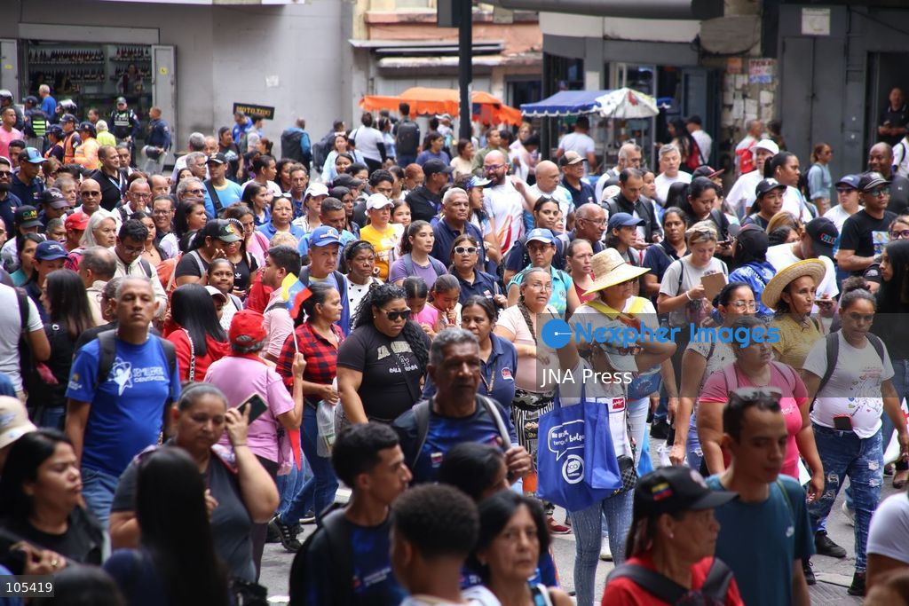 CARACAS, VENEZUELA, OCTOBER 13, 2026: Venezuelan government supporters take part in a march in central Caracas to demand the lifting of economic sanctions. The mobilisation was organised by the ruling United Socialist Party of Venezuela (PSUV). Photo by Moises Quintero / JNA Press. (Photo by Moisés Quintero/JNA Press via Nexpher Images)