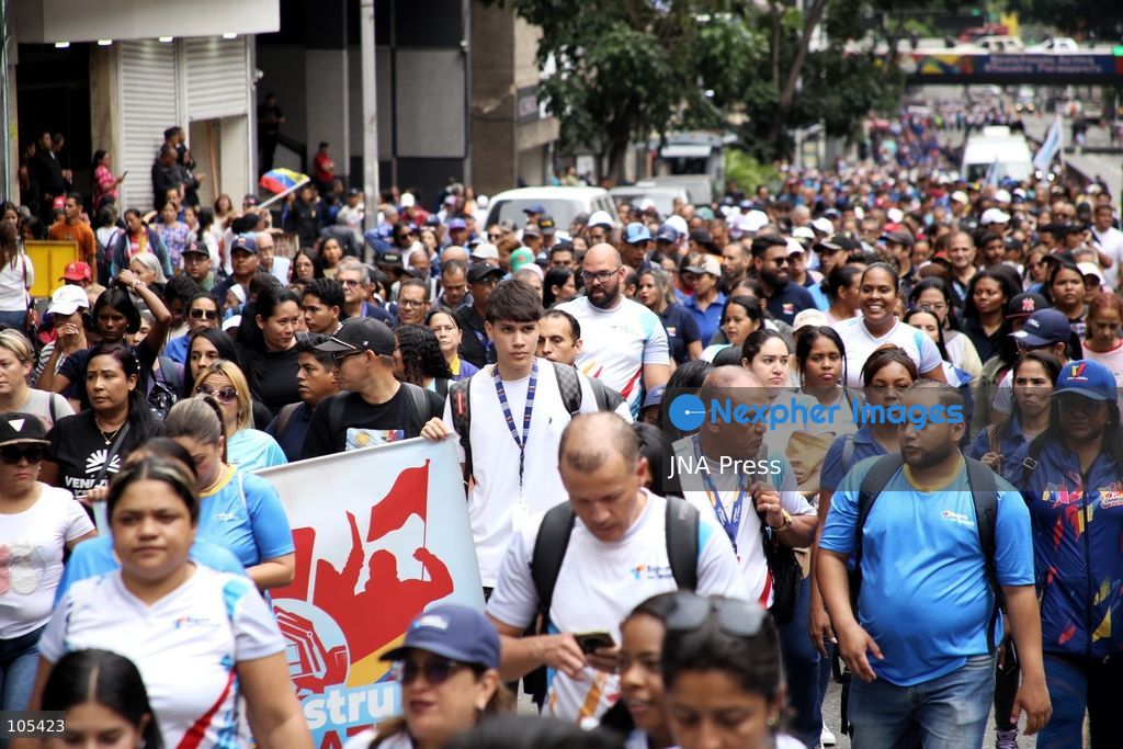 CARACAS, VENEZUELA, OCTOBER 13, 2026: Venezuelan government supporters take part in a march in central Caracas to demand the lifting of economic sanctions. The mobilisation was organised by the ruling United Socialist Party of Venezuela (PSUV). Photo by Moises Quintero / JNA Press. (Photo by Moisés Quintero/JNA Press via Nexpher Images)