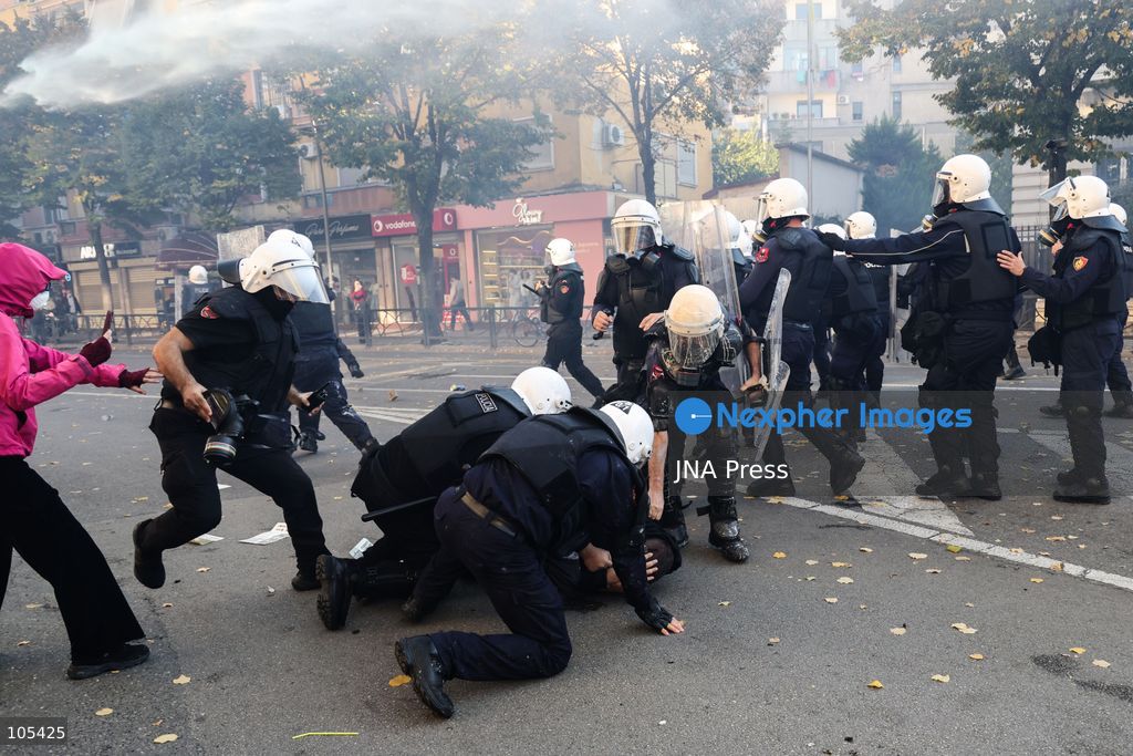 TIRANA, ALBANIA, OCTOBER 13, 2026: Student demonstrators clash with riot police outside the Ministry of Education in Tirana during a protest over university conditions, higher education costs and employment prospects. Police deploy tear gas and water cannons as protesters throw bricks and other objects. Several demonstrators are detained. Photo by Vlasov Sulaj / JNA Press. (Photo by Vlasov Sulaj/JNA Press via Nexpher Images)