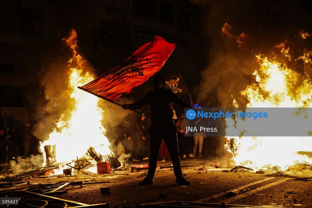 TIRANA, ALBANIA, OCTOBER 13, 2026: Student demonstrators clash with riot police outside the Ministry of Education in Tirana during a protest over university conditions, higher education costs and employment prospects. Police deploy tear gas and water cannons as protesters throw bricks and other objects. Several demonstrators are detained. Photo by Vlasov Sulaj / JNA Press. (Photo by Vlasov Sulaj/JNA Press via Nexpher Images)
