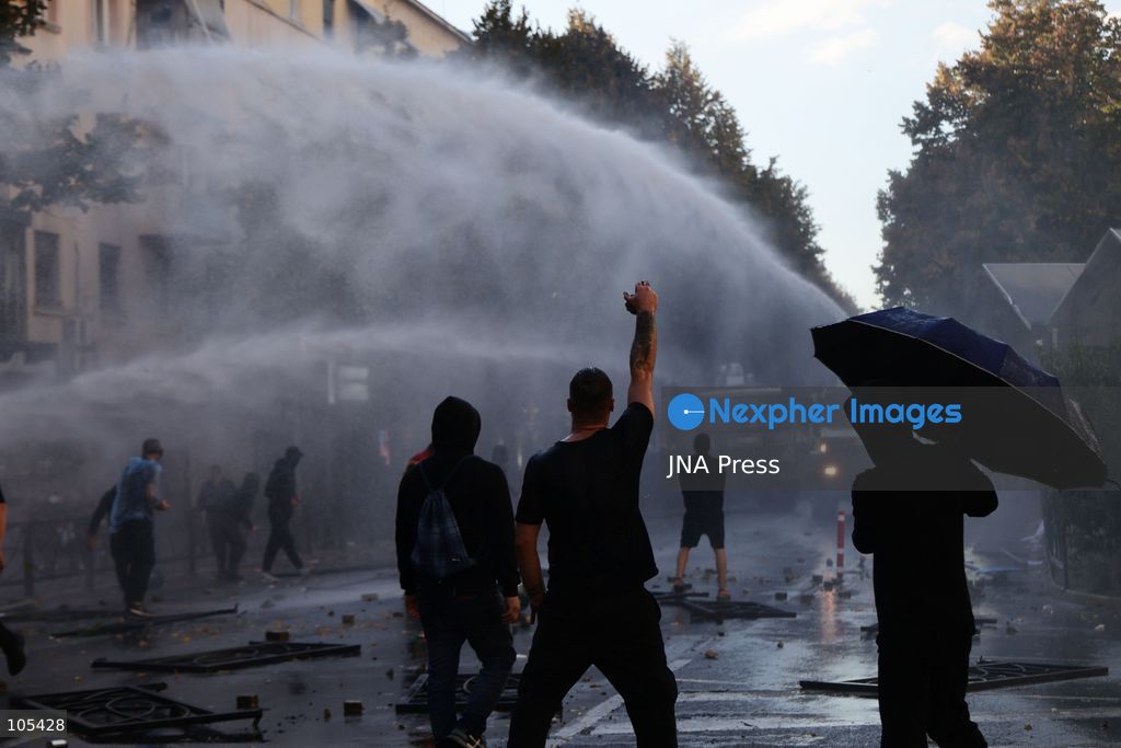 TIRANA, ALBANIA, OCTOBER 13, 2026: Student demonstrators clash with riot police outside the Ministry of Education in Tirana during a protest over university conditions, higher education costs and employment prospects. Police deploy tear gas and water cannons as protesters throw bricks and other objects. Several demonstrators are detained. Photo by Vlasov Sulaj / JNA Press. (Photo by Vlasov Sulaj/JNA Press via Nexpher Images)