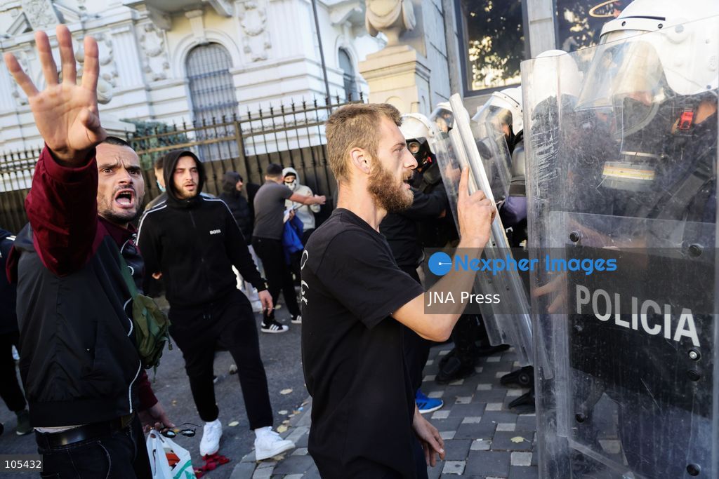 TIRANA, ALBANIA, OCTOBER 13, 2026: Student demonstrators clash with riot police outside the Ministry of Education in Tirana during a protest over university conditions, higher education costs and employment prospects. Police deploy tear gas and water cannons as protesters throw bricks and other objects. Several demonstrators are detained. Photo by Vlasov Sulaj / JNA Press. (Photo by Vlasov Sulaj/JNA Press via Nexpher Images)