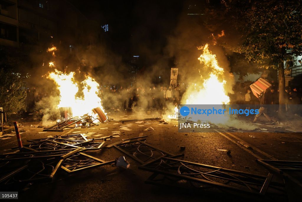 TIRANA, ALBANIA, OCTOBER 13, 2026: Student demonstrators clash with riot police outside the Ministry of Education in Tirana during a protest over university conditions, higher education costs and employment prospects. Police deploy tear gas and water cannons as protesters throw bricks and other objects. Several demonstrators are detained. Photo by Vlasov Sulaj / JNA Press. (Photo by Vlasov Sulaj/JNA Press via Nexpher Images)