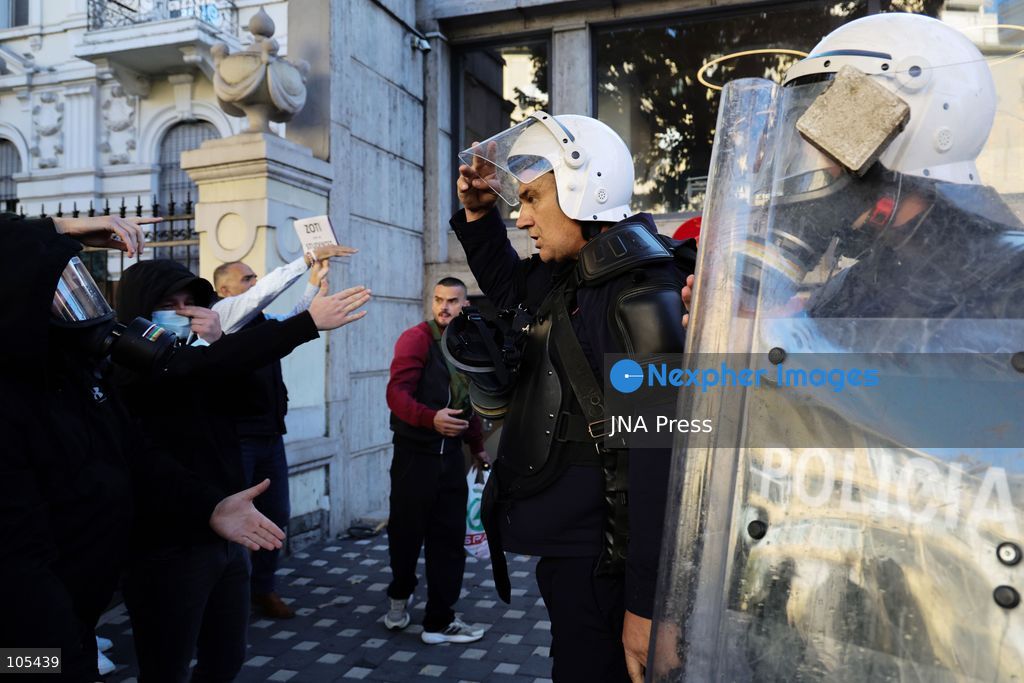 TIRANA, ALBANIA, OCTOBER 13, 2026: Student demonstrators clash with riot police outside the Ministry of Education in Tirana during a protest over university conditions, higher education costs and employment prospects. Police deploy tear gas and water cannons as protesters throw bricks and other objects. Several demonstrators are detained. Photo by Vlasov Sulaj / JNA Press. (Photo by Vlasov Sulaj/JNA Press via Nexpher Images)