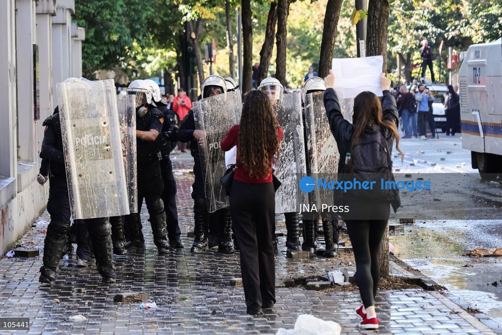 TIRANA, ALBANIA, OCTOBER 13, 2026: Student demonstrators clash with riot police outside the Ministry of Education in Tirana during a protest over university conditions, higher education costs and employment prospects. Police deploy tear gas and water cannons as protesters throw bricks and other objects. Several demonstrators are detained. Photo by Vlasov Sulaj / JNA Press. (Photo by Vlasov Sulaj/JNA Press via Nexpher Images)