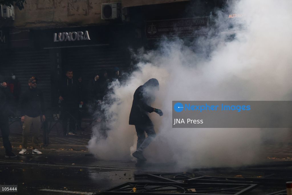 TIRANA, ALBANIA, OCTOBER 13, 2026: Student demonstrators clash with riot police outside the Ministry of Education in Tirana during a protest over university conditions, higher education costs and employment prospects. Police deploy tear gas and water cannons as protesters throw bricks and other objects. Several demonstrators are detained. Photo by Vlasov Sulaj / JNA Press. (Photo by Vlasov Sulaj/JNA Press via Nexpher Images)
