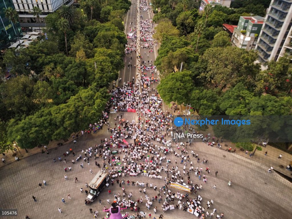 MEXICO CITY, MEXICO, OCTOBER 13, 2026: Workers from the Mexican Social Security Institute (IMSS) march through Mexico City to demand a 10 percent pay increase, improved working conditions and adequate supplies of medicines and medical equipment. The demonstration comes ahead of a union vote on a proposed pay and benefits package. Photo by Carlos Santiago / JNA Press. (Photo by Carlos Santiago/JNA Press via Nexpher Images)