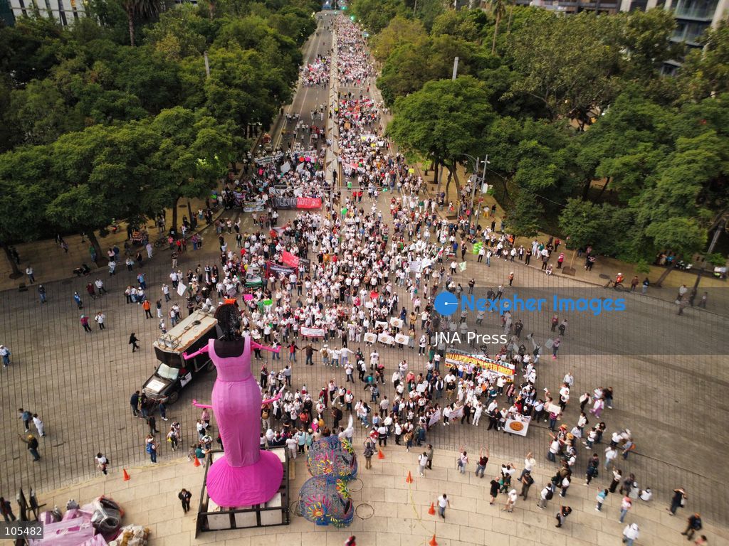 MEXICO CITY, MEXICO, OCTOBER 13, 2026: Workers from the Mexican Social Security Institute (IMSS) march through Mexico City to demand a 10 percent pay increase, improved working conditions and adequate supplies of medicines and medical equipment. The demonstration comes ahead of a union vote on a proposed pay and benefits package. Photo by Carlos Santiago / JNA Press. (Photo by Carlos Santiago/JNA Press via Nexpher Images)