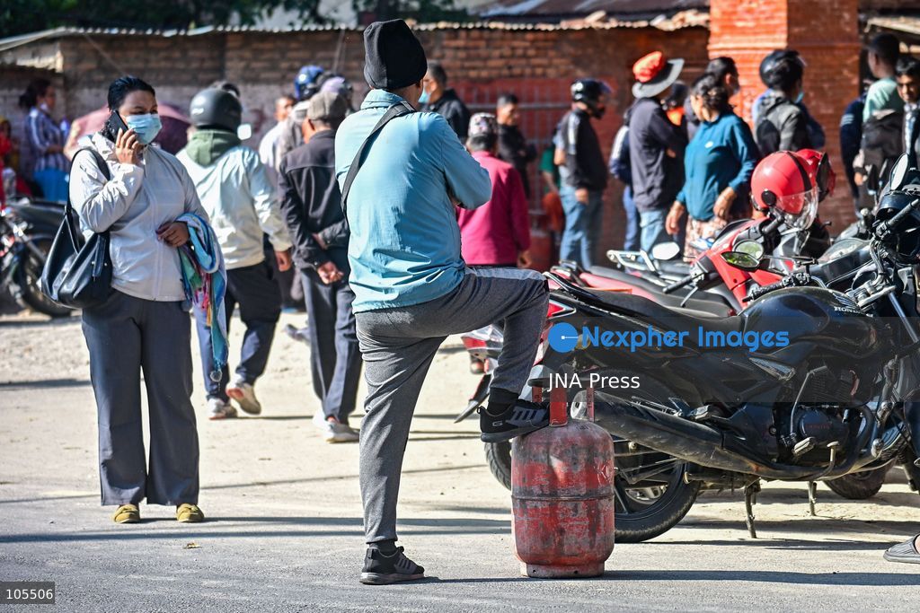 KATHMANDU, NEPAL, OCTOBER 14, 2026: Consumers queue with empty liquefied petroleum gas (LPG) cylinders at a distribution centre in Kathmandu amid a cooking gas shortage during the Dashain festival. Floods and landslides have disrupted transport routes supplying the capital, compounding difficulties in obtaining gas for household cooking and festival preparations. Photo by Safal Prakash Shrestha / JNA Press. (Photo by Safal Prakash Shrestha/JNA Press via Nexpher Images)