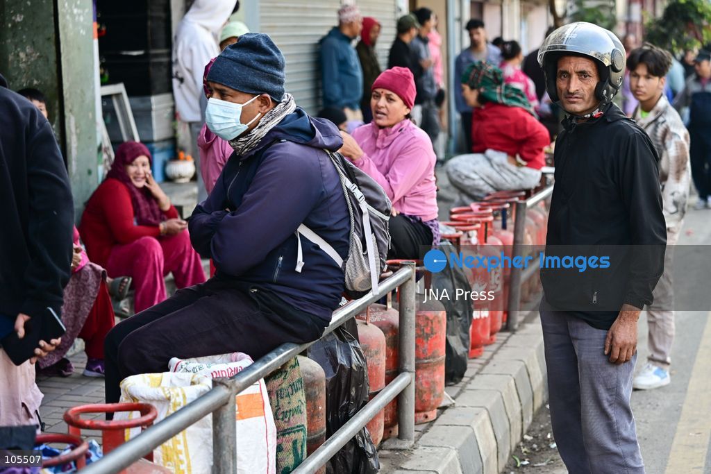 KATHMANDU, NEPAL, OCTOBER 14, 2026: Consumers queue with empty liquefied petroleum gas (LPG) cylinders at a distribution centre in Kathmandu amid a cooking gas shortage during the Dashain festival. Floods and landslides have disrupted transport routes supplying the capital, compounding difficulties in obtaining gas for household cooking and festival preparations. Photo by Safal Prakash Shrestha / JNA Press. (Photo by Safal Prakash Shrestha/JNA Press via Nexpher Images)