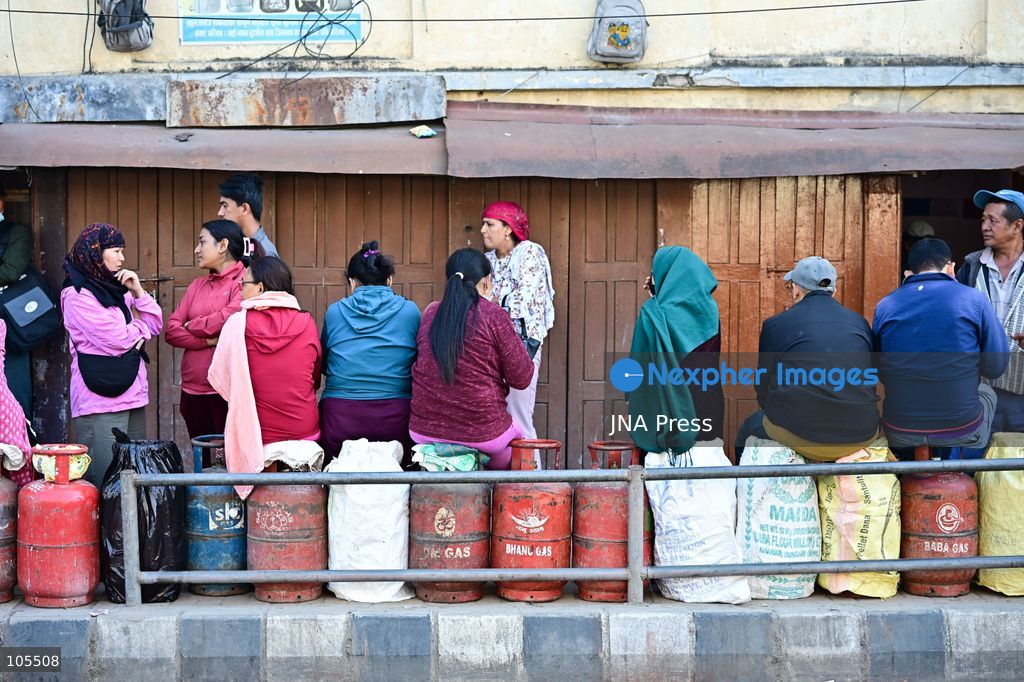 KATHMANDU, NEPAL, OCTOBER 14, 2026: Consumers queue with empty liquefied petroleum gas (LPG) cylinders at a distribution centre in Kathmandu amid a cooking gas shortage during the Dashain festival. Floods and landslides have disrupted transport routes supplying the capital, compounding difficulties in obtaining gas for household cooking and festival preparations. Photo by Safal Prakash Shrestha / JNA Press. (Photo by Safal Prakash Shrestha/JNA Press via Nexpher Images)