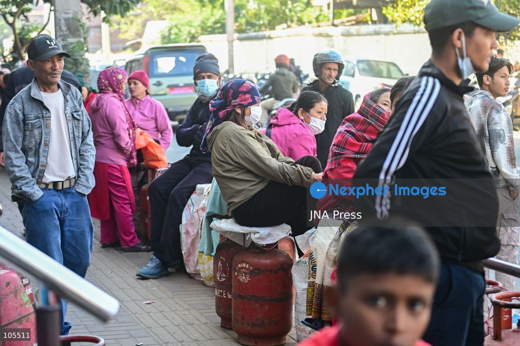 KATHMANDU, NEPAL, OCTOBER 14, 2026: Consumers queue with empty liquefied petroleum gas (LPG) cylinders at a distribution centre in Kathmandu amid a cooking gas shortage during the Dashain festival. Floods and landslides have disrupted transport routes supplying the capital, compounding difficulties in obtaining gas for household cooking and festival preparations. Photo by Safal Prakash Shrestha / JNA Press. (Photo by Safal Prakash Shrestha/JNA Press via Nexpher Images)