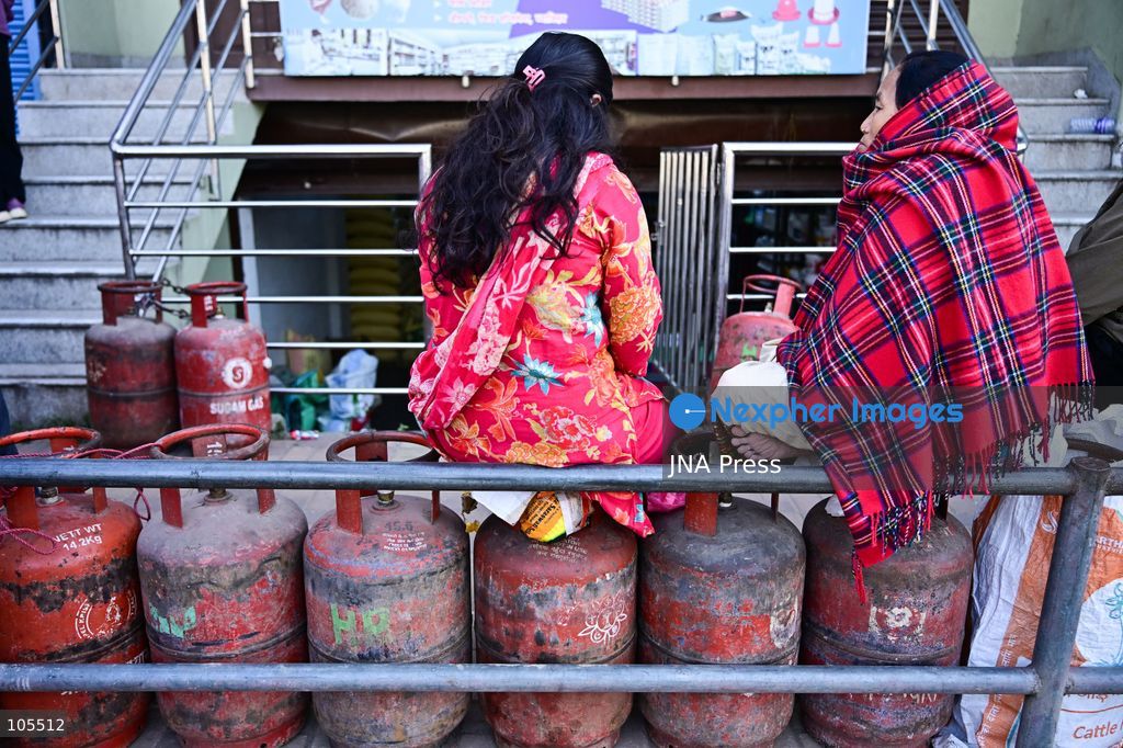 KATHMANDU, NEPAL, OCTOBER 14, 2026: Consumers queue with empty liquefied petroleum gas (LPG) cylinders at a distribution centre in Kathmandu amid a cooking gas shortage during the Dashain festival. Floods and landslides have disrupted transport routes supplying the capital, compounding difficulties in obtaining gas for household cooking and festival preparations. Photo by Safal Prakash Shrestha / JNA Press. (Photo by Safal Prakash Shrestha/JNA Press via Nexpher Images)