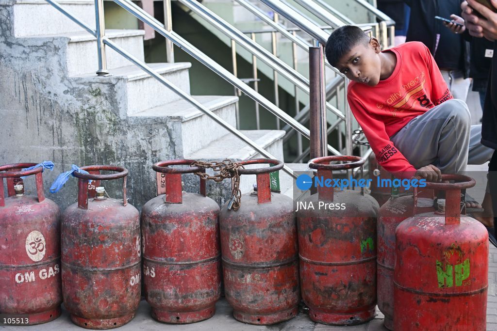 KATHMANDU, NEPAL, OCTOBER 14, 2026: Consumers queue with empty liquefied petroleum gas (LPG) cylinders at a distribution centre in Kathmandu amid a cooking gas shortage during the Dashain festival. Floods and landslides have disrupted transport routes supplying the capital, compounding difficulties in obtaining gas for household cooking and festival preparations. Photo by Safal Prakash Shrestha / JNA Press. (Photo by Safal Prakash Shrestha/JNA Press via Nexpher Images)
