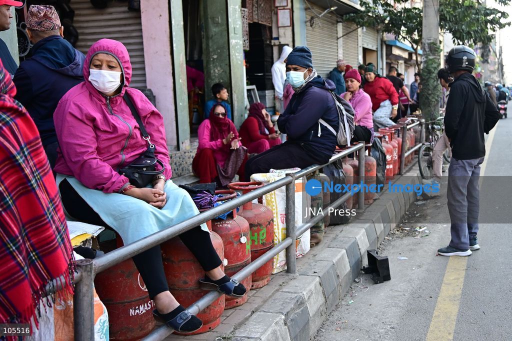 KATHMANDU, NEPAL, OCTOBER 14, 2026: Consumers queue with empty liquefied petroleum gas (LPG) cylinders at a distribution centre in Kathmandu amid a cooking gas shortage during the Dashain festival. Floods and landslides have disrupted transport routes supplying the capital, compounding difficulties in obtaining gas for household cooking and festival preparations. Photo by Safal Prakash Shrestha / JNA Press. (Photo by Safal Prakash Shrestha/JNA Press via Nexpher Images)