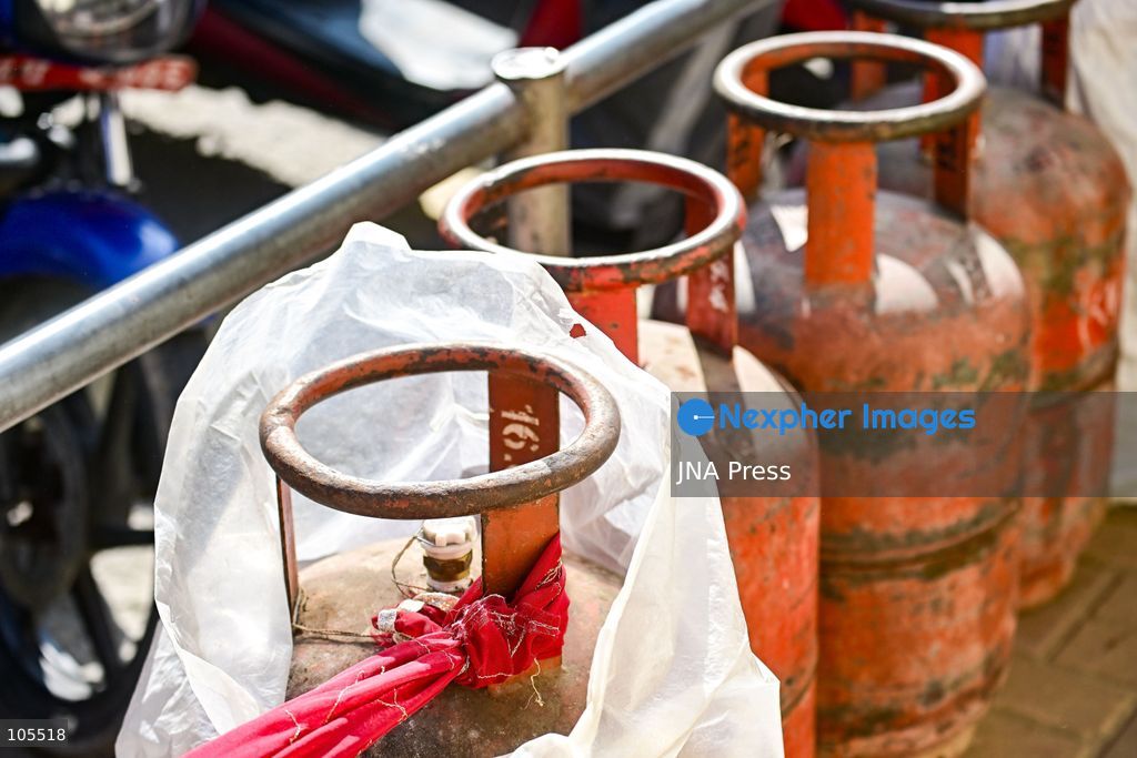 KATHMANDU, NEPAL, OCTOBER 14, 2026: Consumers queue with empty liquefied petroleum gas (LPG) cylinders at a distribution centre in Kathmandu amid a cooking gas shortage during the Dashain festival. Floods and landslides have disrupted transport routes supplying the capital, compounding difficulties in obtaining gas for household cooking and festival preparations. Photo by Safal Prakash Shrestha / JNA Press. (Photo by Safal Prakash Shrestha/JNA Press via Nexpher Images)