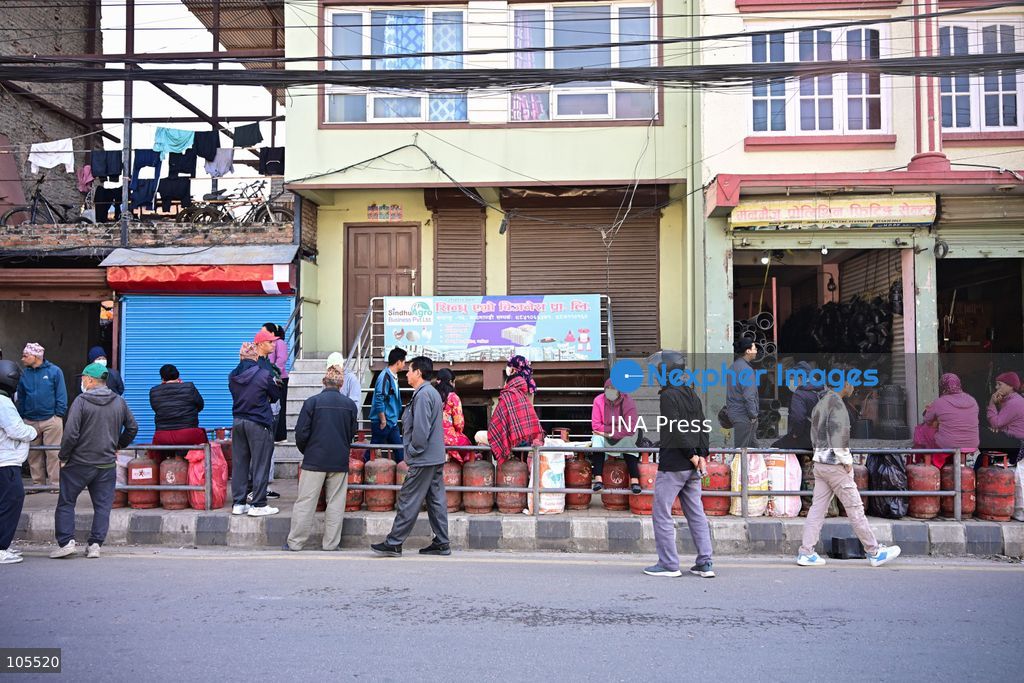 KATHMANDU, NEPAL, OCTOBER 14, 2026: Consumers queue with empty liquefied petroleum gas (LPG) cylinders at a distribution centre in Kathmandu amid a cooking gas shortage during the Dashain festival. Floods and landslides have disrupted transport routes supplying the capital, compounding difficulties in obtaining gas for household cooking and festival preparations. Photo by Safal Prakash Shrestha / JNA Press. (Photo by Safal Prakash Shrestha/JNA Press via Nexpher Images)