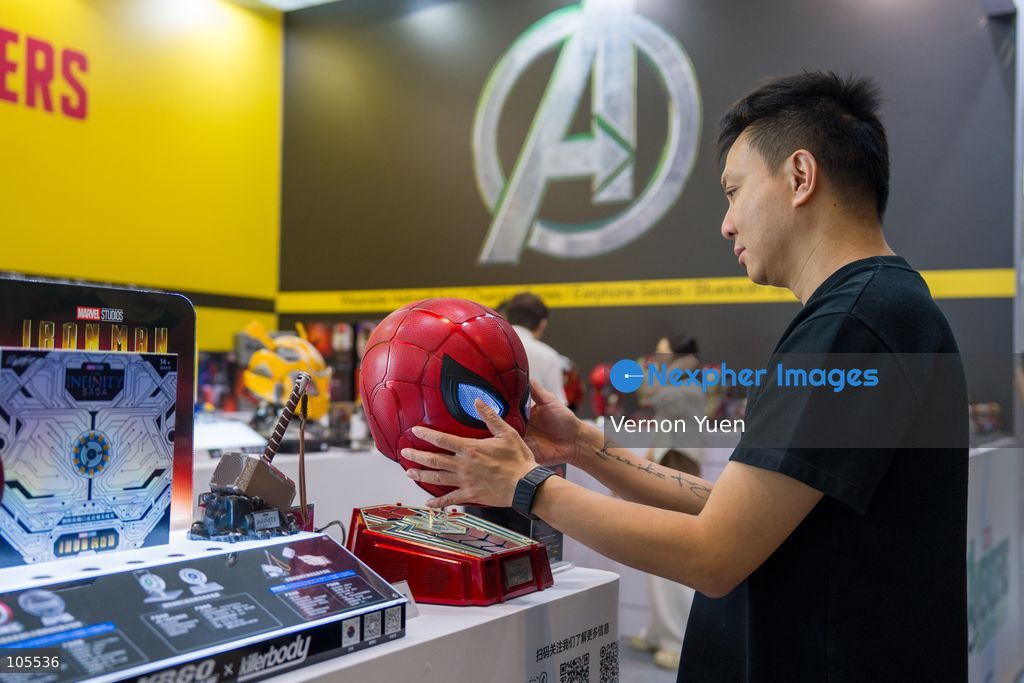 A man holding the model head of Spiderman at the Hong Kong Electronics Fair on October 14, 2026 in Hong Kong. (Photo by Vernon Yuen/Nexpher Images)