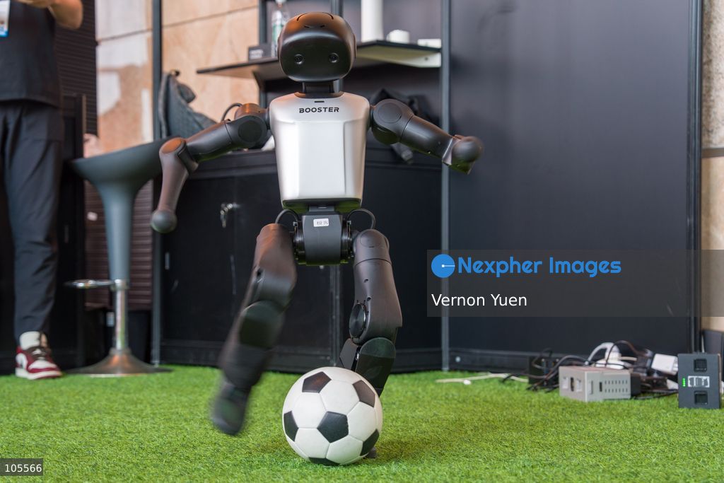 A robot playing soccer at the Hong Kong Electronics Fair on October 14, 2026 in Hong Kong. (Photo by Vernon Yuen/Nexpher Images)