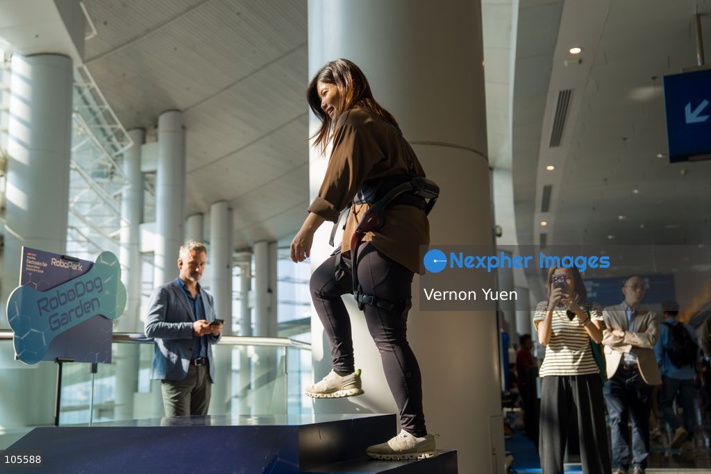 People trying a exoskeleton at the Hong Kong Electronics Fair on October 14, 2026 in Hong Kong. (Photo by Vernon Yuen/Nexpher Images)