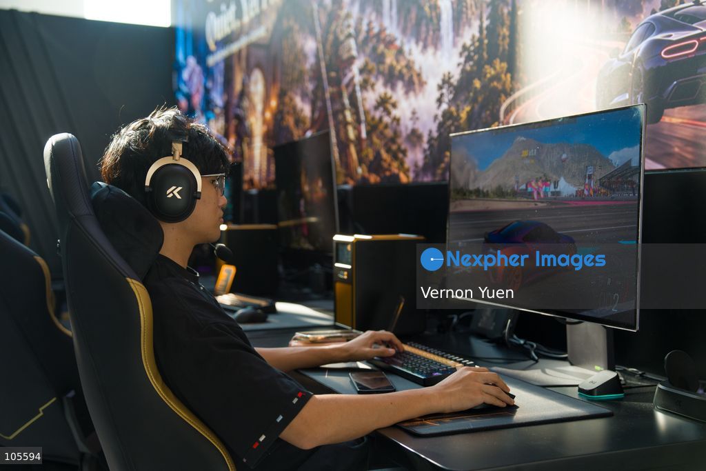 A gamer playing on a computer at the Hong Kong Electronics Fair on October 14, 2026 in Hong Kong. (Photo by Vernon Yuen/Nexpher Images)