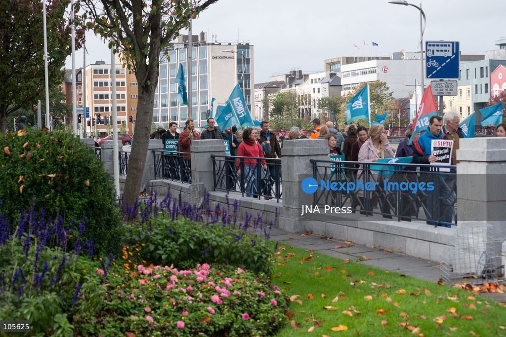 CORK, IRELAND, OCTOBER 14, 2026: Trade union members demonstrate in Cork during a nationwide 24-hour public sector strike over pay and the rising cost of living. The industrial action disrupts schools, healthcare and other public services, while essential emergency services remain available. Photo by Steven Slevin / JNA Press. (Photo by Steven Slevin/JNA Press via Nexpher Images)