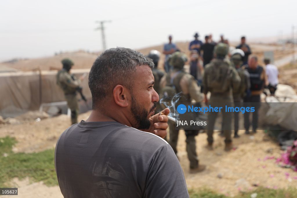 UMM AL-KHAIR, WEST BANK, PALESTINE, OCTOBER 14, 2026: Israeli forces demolish a Palestinian home and confiscate a portable toilet in Umm al-Khair, in Masafer Yatta, south of Hebron, in the occupied West Bank. The demolished dwelling housed a family of seven, according to Palestinian news agency WAFA. Photo by Mosab Shawer / JNA Press. (Photo by Mosab shawer/JNA Press via Nexpher Images)