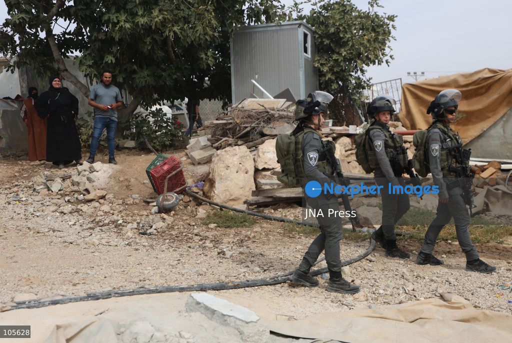 UMM AL-KHAIR, WEST BANK, PALESTINE, OCTOBER 14, 2026: Israeli forces demolish a Palestinian home and confiscate a portable toilet in Umm al-Khair, in Masafer Yatta, south of Hebron, in the occupied West Bank. The demolished dwelling housed a family of seven, according to Palestinian news agency WAFA. Photo by Mosab Shawer / JNA Press. (Photo by Mosab shawer/JNA Press via Nexpher Images)