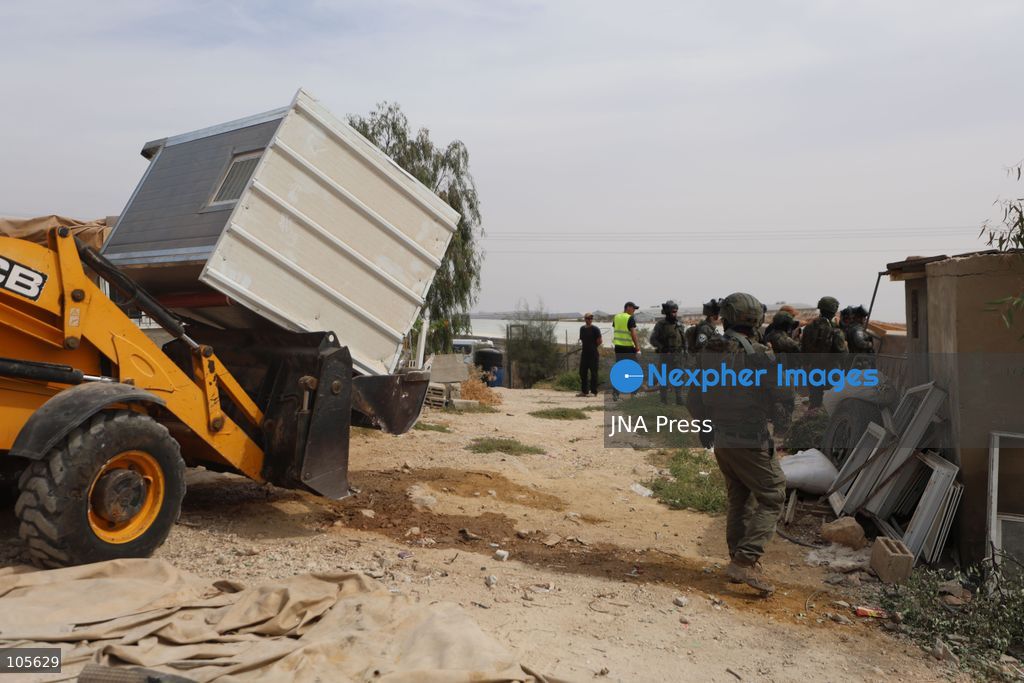 UMM AL-KHAIR, WEST BANK, PALESTINE, OCTOBER 14, 2026: Israeli forces demolish a Palestinian home and confiscate a portable toilet in Umm al-Khair, in Masafer Yatta, south of Hebron, in the occupied West Bank. The demolished dwelling housed a family of seven, according to Palestinian news agency WAFA. Photo by Mosab Shawer / JNA Press. (Photo by Mosab shawer/JNA Press via Nexpher Images)