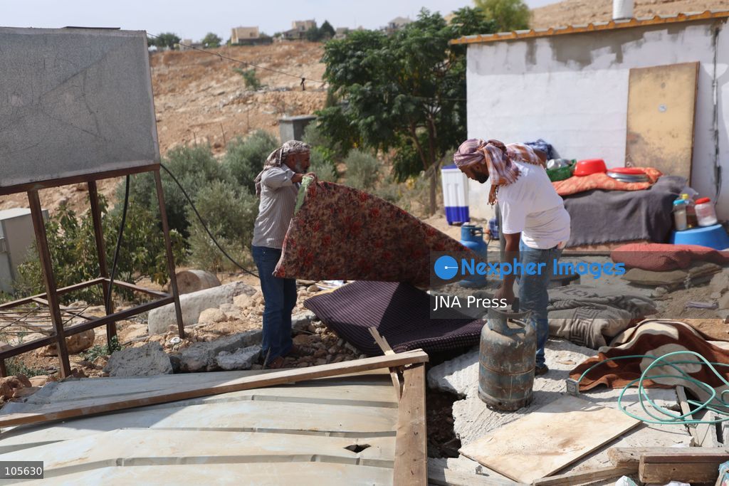 UMM AL-KHAIR, WEST BANK, PALESTINE, OCTOBER 14, 2026: Israeli forces demolish a Palestinian home and confiscate a portable toilet in Umm al-Khair, in Masafer Yatta, south of Hebron, in the occupied West Bank. The demolished dwelling housed a family of seven, according to Palestinian news agency WAFA. Photo by Mosab Shawer / JNA Press. (Photo by Mosab shawer/JNA Press via Nexpher Images)