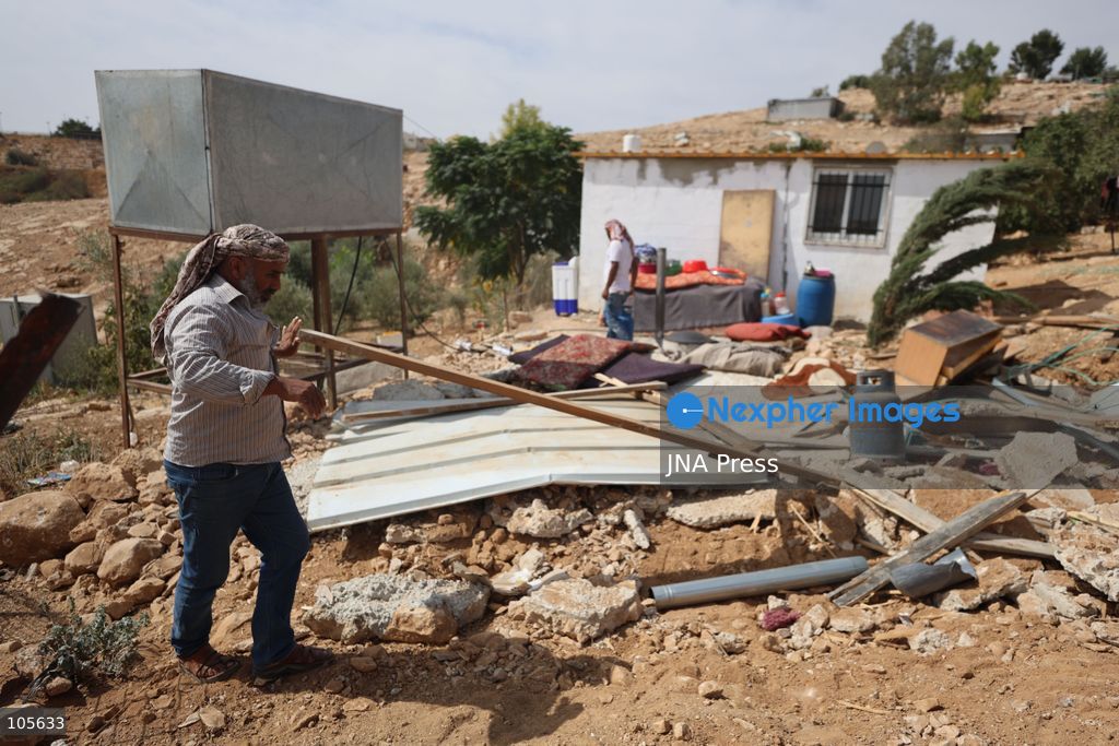 UMM AL-KHAIR, WEST BANK, PALESTINE, OCTOBER 14, 2026: Israeli forces demolish a Palestinian home and confiscate a portable toilet in Umm al-Khair, in Masafer Yatta, south of Hebron, in the occupied West Bank. The demolished dwelling housed a family of seven, according to Palestinian news agency WAFA. Photo by Mosab Shawer / JNA Press. (Photo by Mosab shawer/JNA Press via Nexpher Images)