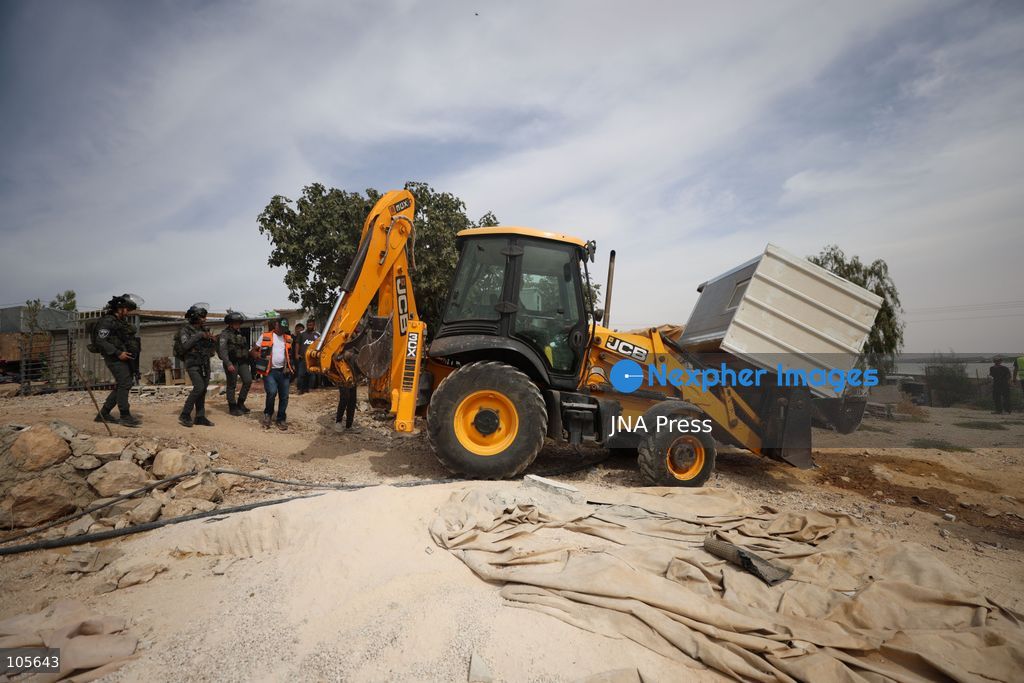UMM AL-KHAIR, WEST BANK, PALESTINE, OCTOBER 14, 2026: Israeli forces demolish a Palestinian home and confiscate a portable toilet in Umm al-Khair, in Masafer Yatta, south of Hebron, in the occupied West Bank. The demolished dwelling housed a family of seven, according to Palestinian news agency WAFA. Photo by Mosab Shawer / JNA Press. (Photo by Mosab shawer/JNA Press via Nexpher Images)