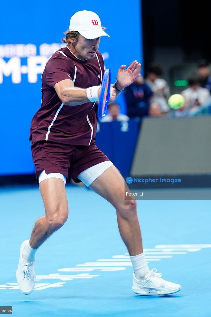 Alex De Minaur of Australia in action against Novak Djokovic of Serbia during their Men's Singles final match on day seven of China Open at the National Tennis Center on October 6, 2026 in Beijing, China. (Photo by Peter Li/Nexpher Images)
